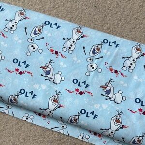 Disney Frozen II Pale Blue and White Olaf Pattern Fabric